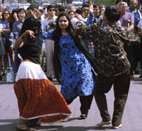 students dancing at street fair